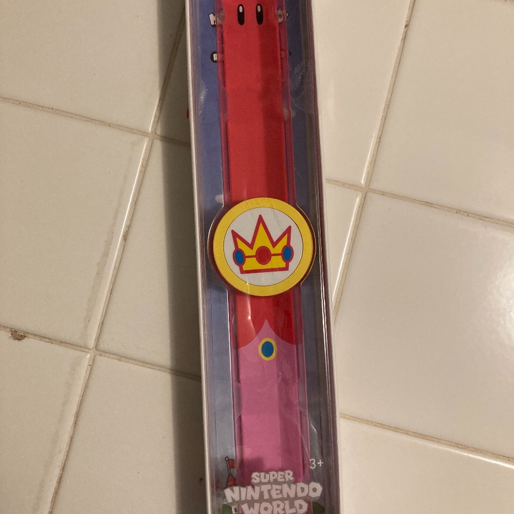SOLDNintendo Power Up Band Princess Peach